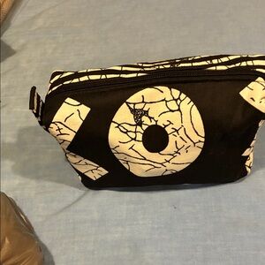 Chic Striped Black and White Pouch. Multipurpose, can be used as a cosmetic bag